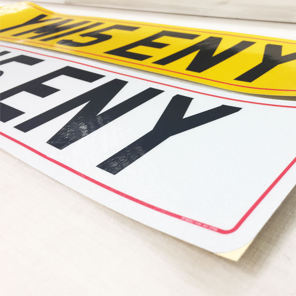 Set of self adhesive number plates